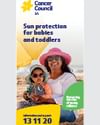 Adult in pink hat holds a child on a beach; Cancer Council SA sun protection poster.