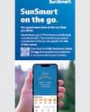 Tall ad banner showing a hand holding a smartphone with a blue SunSmart on the go app screen.